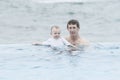 Father and Toddler Boy in Pool at a Resort in Mexico Royalty Free Stock Photo