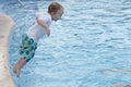 Father and Toddler Boy in Pool at a Resort in Mexico