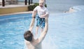 Father and Toddler Boy in Pool at a Resort in Mexico Royalty Free Stock Photo