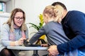 Father and toddler daughter in therapist office during counselling assessment meeting. Royalty Free Stock Photo