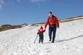 Father and toddler hiking