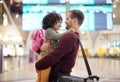 Father, travel and hug girl at airport, laughing at comic joke and having fun together. Immigration flight, adoption