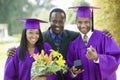 Father With Two Graduates Outside Royalty Free Stock Photo