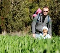 Father with two kids outdoors Royalty Free Stock Photo