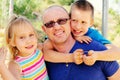 Father with two kids outdoors Royalty Free Stock Photo