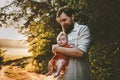 Father walking with baby daughter family lifestyle