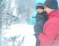 Father walks with little son at winter park