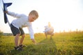 Father& x27;s day. dad and baby son playing together outdoors plane Royalty Free Stock Photo