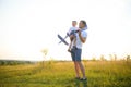 Father& x27;s day. dad and baby son playing together outdoors plane Royalty Free Stock Photo