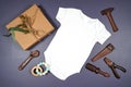 Father's Day or masculine birthday theme baby romper onesie flatlay mockup.