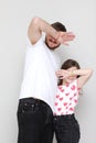 father's day. side view affectionate little child daughter having fun with smiling bearded father. Happy small kid girl