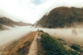 A father with a young son walking along a path in the Caucasus Royalty Free Stock Photo