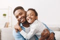 Fatherhood concept. Lovely father and daughter embracing Royalty Free Stock Photo