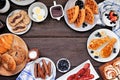 Fathers Day breakfast frame. Top down view on a dark wood background.