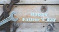 Fathers day concept, Various size spanners, wrenches on wooden background