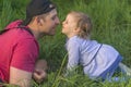 Fathers day. Father and his smiling happy daughter have fun at green park Royalty Free Stock Photo