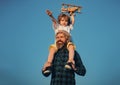 Fathers day. Father and son. Father giving son ride on back. Portrait of happy father giving son piggyback ride on his Royalty Free Stock Photo