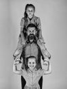 fathers day. happy family concept. bearded father with two small girls. kids love their dad. children with daddy