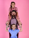 Fathers day. happy family concept. bearded father with two small girls. kids love their dad. children with daddy