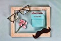 Fathers day. The inscription FOR THE BEST DAD on a self-made gift box, the symbols of Father`s Day are glasses, mustaches, roses.