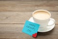 Fathers Day message with coffee cup on grey wooden background Royalty Free Stock Photo