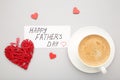 Fathers Day message with coffee cup and hearts on grey background Royalty Free Stock Photo