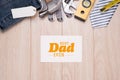 Fathers Day tag with tools and ties frame on wood Royalty Free Stock Photo