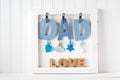 Fathers Day theme with hanging DAD letters Royalty Free Stock Photo