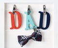 Fathers Day theme with hanging DAD letters Royalty Free Stock Photo