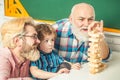 Fathers Day. Three different generations ages: grandfather father and child son together. Royalty Free Stock Photo