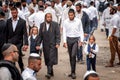 The fathers leads the sons by the hand. The Hasidim pilgrims. Rosh Hashanah, Jewish New Year.