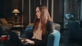 Fatigue woman working laptop in hotel lobby at evening. Tired business woman Royalty Free Stock Photo