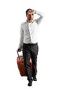 Fatigued businessman with suitcase