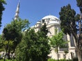 The Fatih mosque in Istanbul, Turkey. Fatih mosque in district of Istanbul. Ottoman minaret and dome.