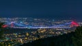 Fatih Sultan Mehmet Bridge view, connects Asia and Europe night timelapse from top of Camlyca hill. Istanbul, Turkey Royalty Free Stock Photo