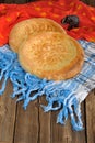 Fatir, uzbek flatbread on blue arab scarf and red cloth with ele
