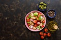 Fattoush Arabian salad. Brown background, top view, space for text.