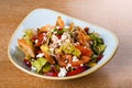 Fattoush is a Levantine salad made from toasted or fried pieces of khubz combined with mixed greens