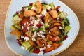 Fattoush is a Levantine salad made from toasted or fried pieces of khubz combined with mixed greens