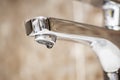 Faucet with dripping water. Tap closeup with dripping water-drop. Water leaking, saving concept Royalty Free Stock Photo