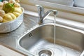 Faucet with a flowing water Royalty Free Stock Photo