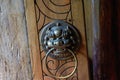Faucet knocker on wooden door of ancient Chinese building Royalty Free Stock Photo