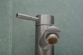 Faucet limescale. Dirty faucet aerator with limescale, calcified shower water tap with lime scale in bathroom, close up. Selective Royalty Free Stock Photo