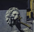 Faucet with a lion`s head Lucca, Italy Royalty Free Stock Photo