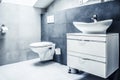 Faucet and water drop close up. Bathroom interior with sink and water tap. Royalty Free Stock Photo