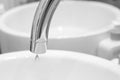 Faucet with water drop close up. The concept of water shortage, save the planet. The concept of expensive utility bills. water Royalty Free Stock Photo