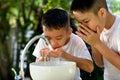 Faucet water and hand Royalty Free Stock Photo