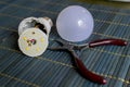 Disassembled led household lamp with a burnt led element is on the table