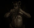 Faun with panflute Royalty Free Stock Photo