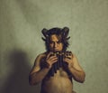 Faun with panflute Royalty Free Stock Photo